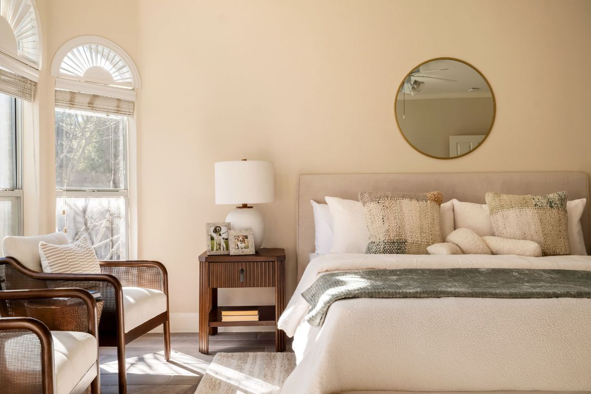 8101 Red Bird Court Austin, TX 78726 - Photo 21 of 33 a bedroom with a bed and wooden floor