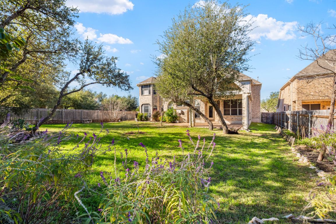 8101 Red Bird Court Austin, TX 78726 - Photo 32 of 33 a view of a house with a big yard