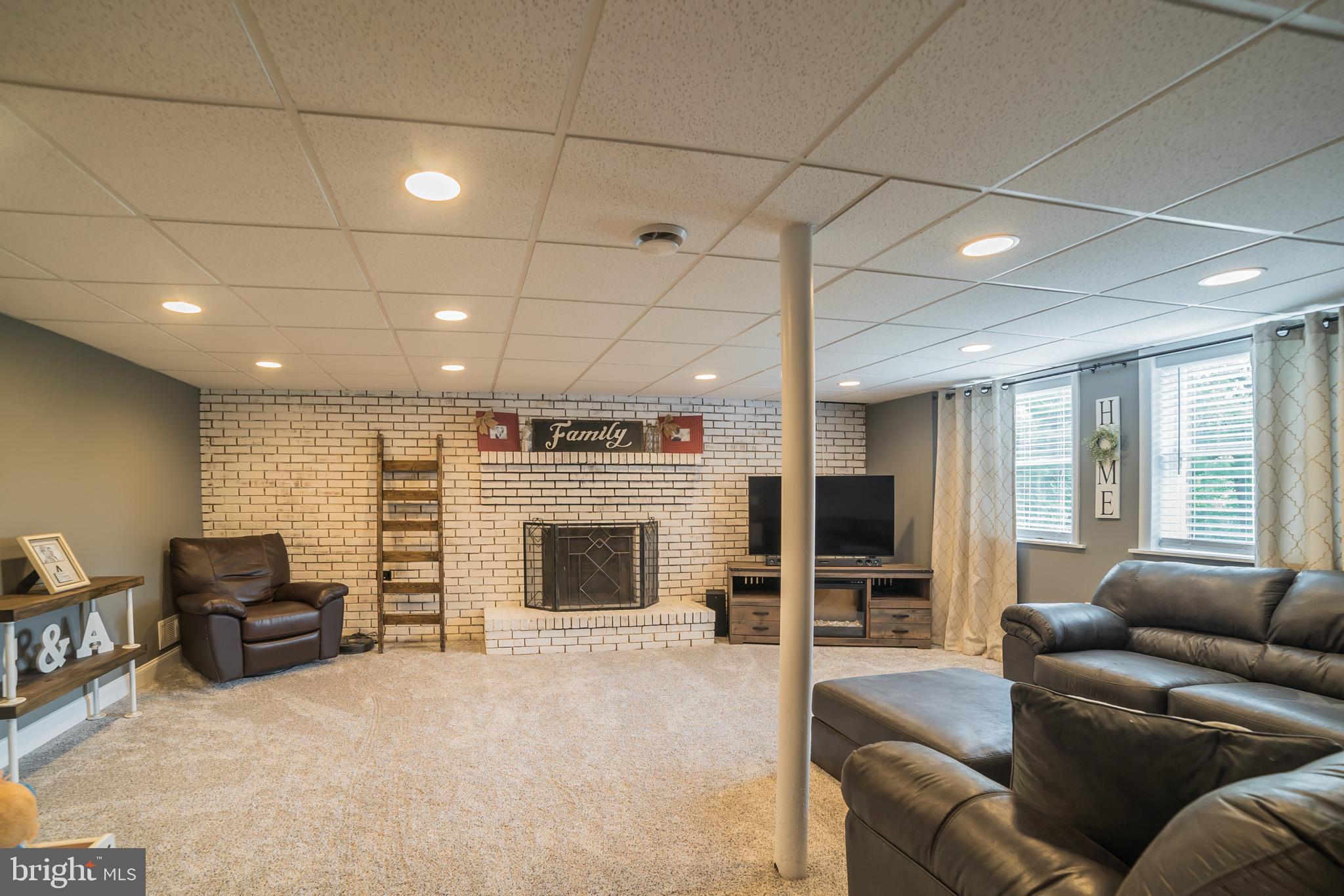 13007 Harford Road Hydes, MD 21082 - Photo 19 of 36 Family Room-New Carpet & Wood Bur