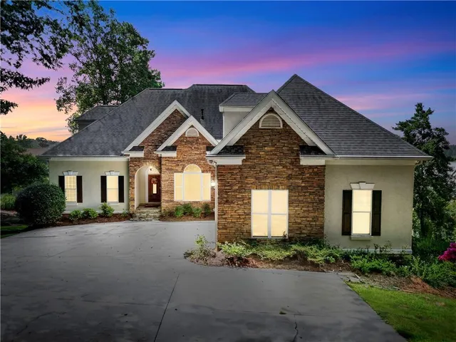 a kitchen with stainless steel appliances granite countertop a stove and a sink
