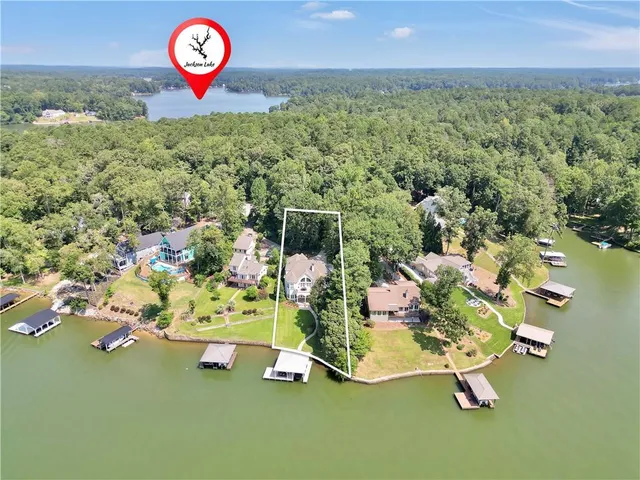 a living room with furniture or couch and a large window