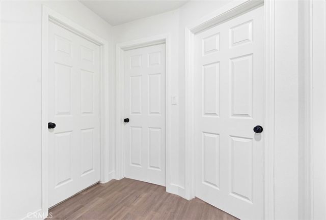 a view of a livingroom with wooden floor