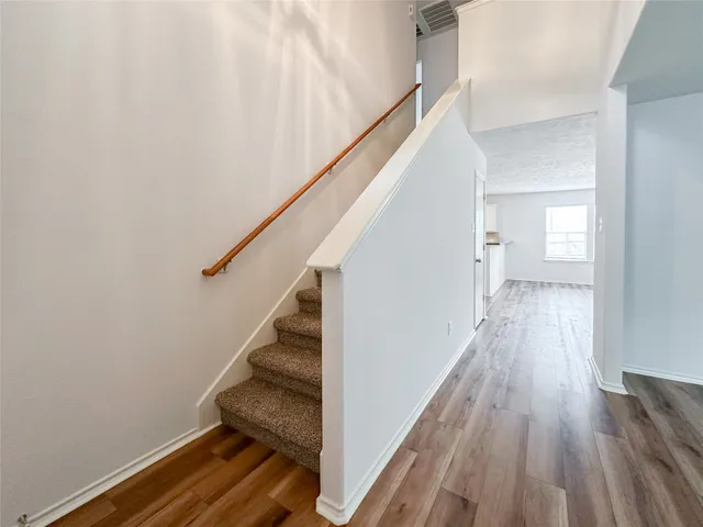 a view of entryway with wooden floor