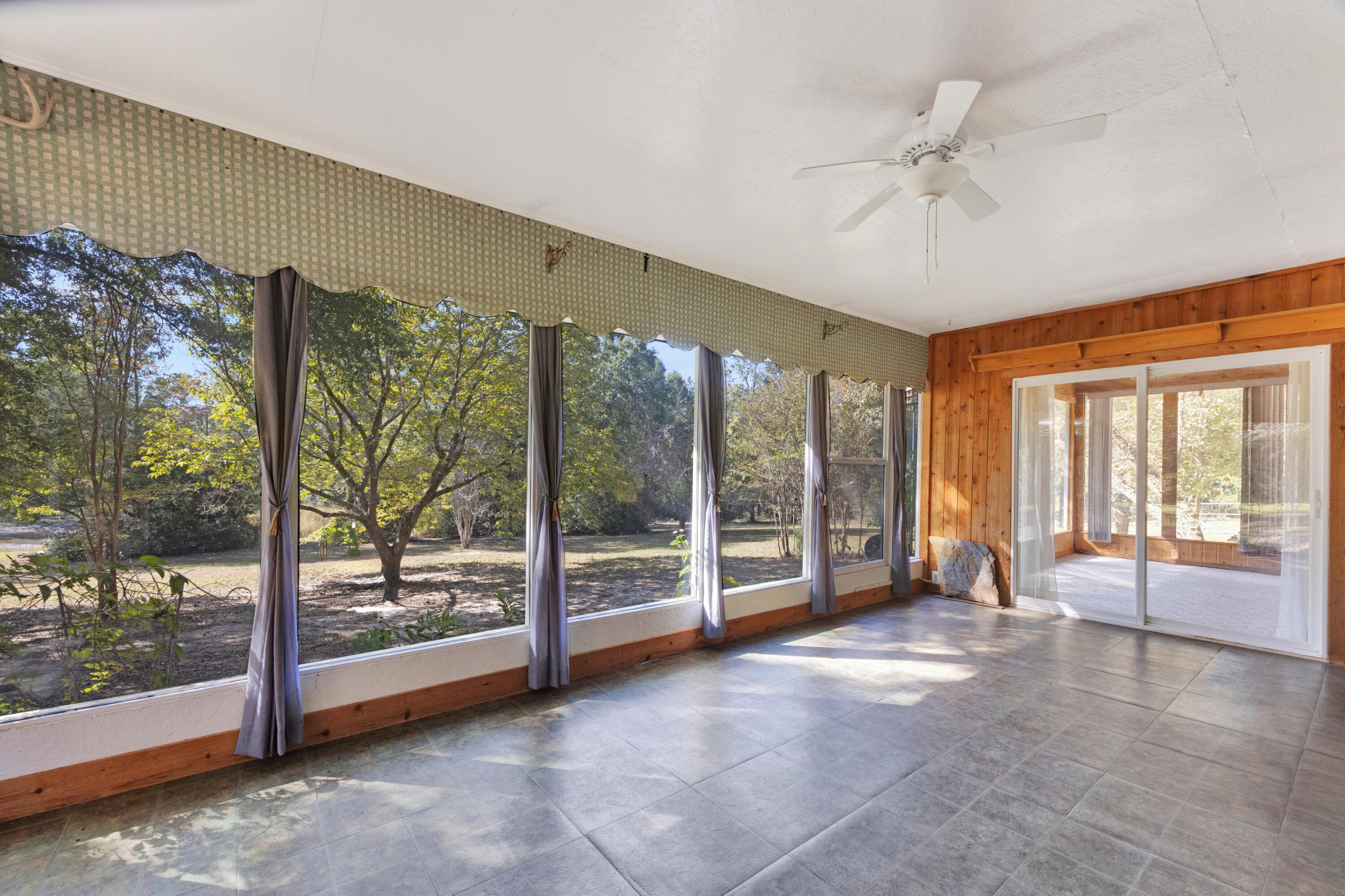 2540 Taylor Road Crestview, FL 32536 - Photo 43 of 75 a view of an empty room with a balcony