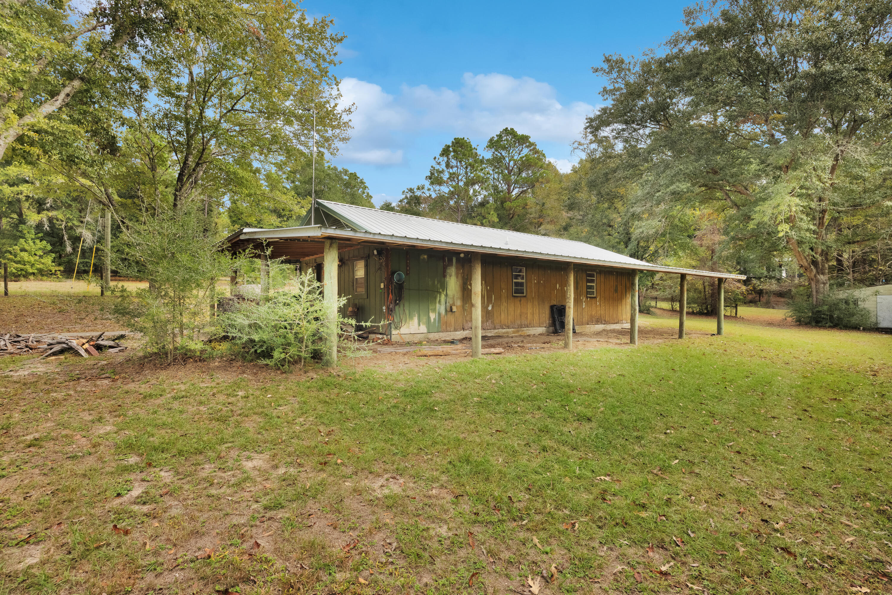 2540 Taylor Road Crestview, FL 32536 - Photo 50 of 75 a front view of a house with yard and green space