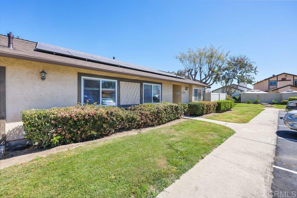 10385 Seth Way Santee, CA 92071 - Photo 6 of 33 a front view of a house with garden
