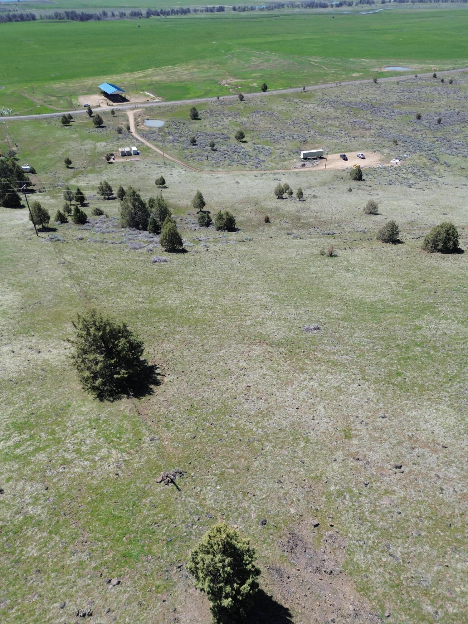 848 Co Rd 87 Adin, CA 96006 - Photo 10 of 13 a view of a dry yard with wooden fence