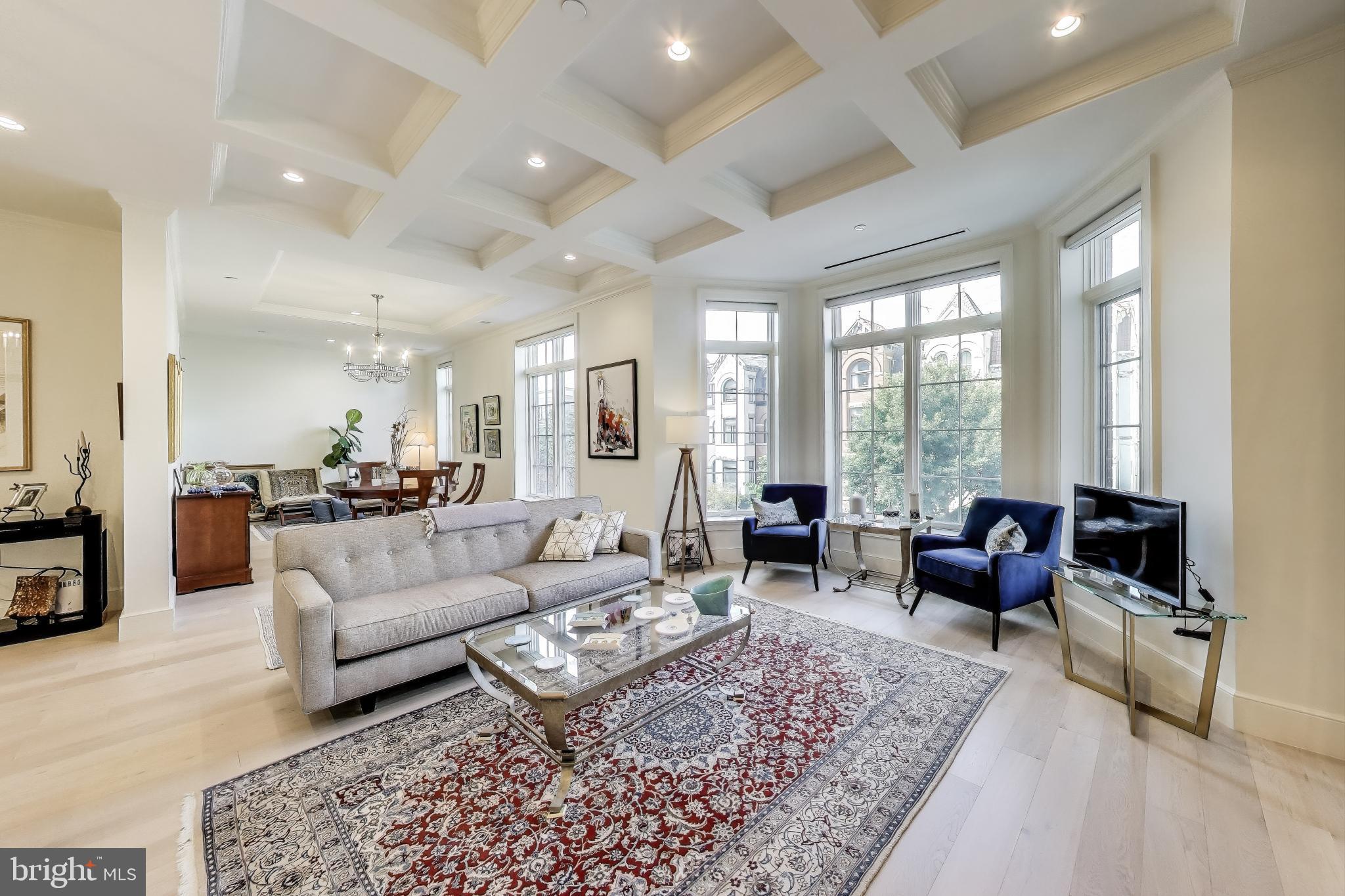 2122 N Street Northwest, Unit 5 Washington, DC 20037 - Photo 2 of 38 a living room with furniture or couch and a large window