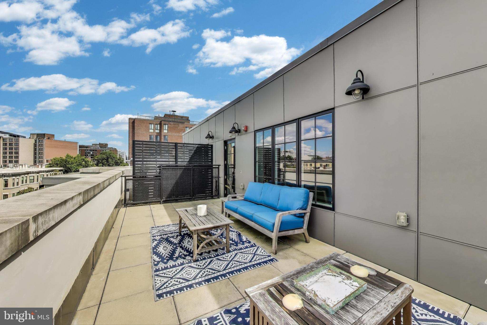 2122 N Street Northwest, Unit 5 Washington, DC 20037 - Photo 26 of 38 a view of a terrace with furniture