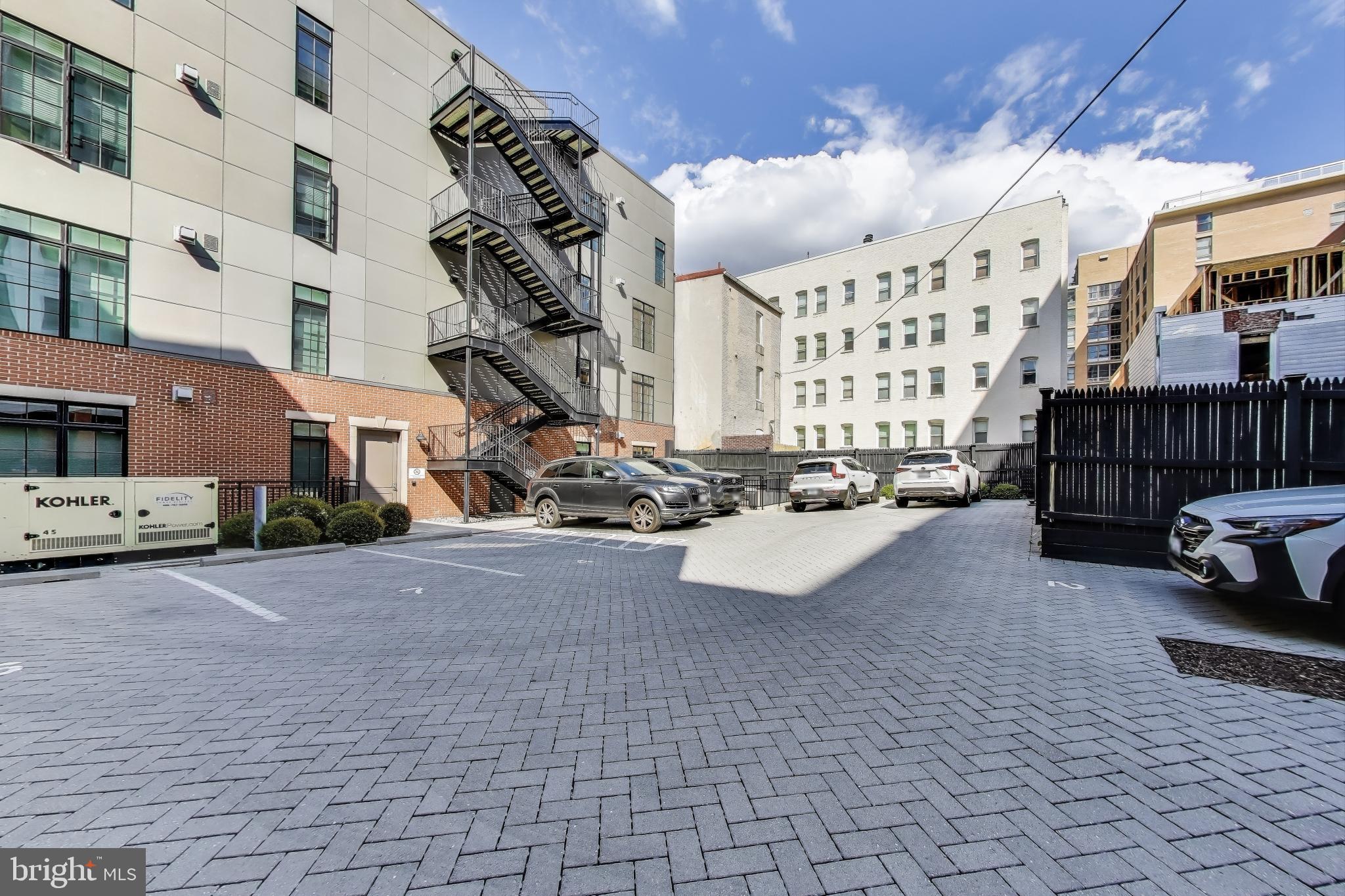 2122 N Street Northwest, Unit 5 Washington, DC 20037 - Photo 31 of 38 a view of front red brick building