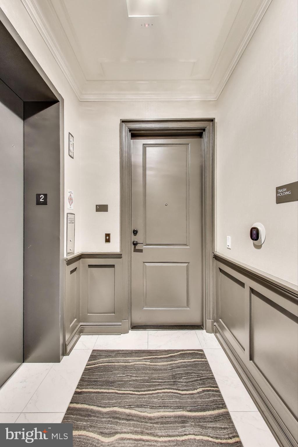 2122 N Street Northwest, Unit 5 Washington, DC 20037 - Photo 36 of 38 a bathroom with a sink and mirror