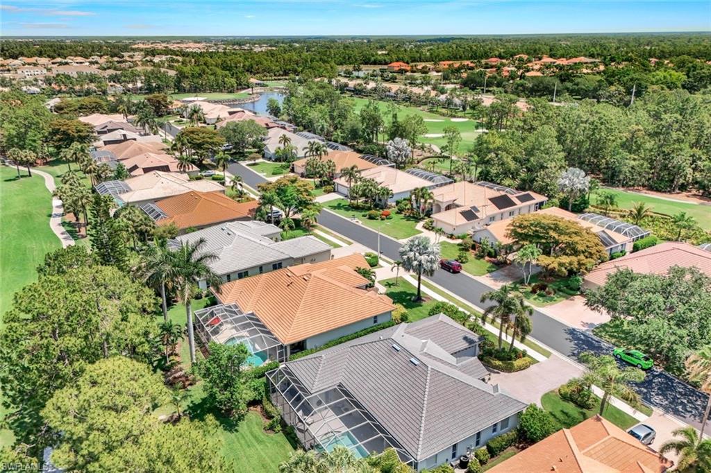8475 Gleneagle Way Naples, FL 34120 - Photo 41 of 46 an aerial view of residential houses with outdoor space