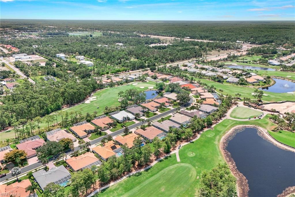 8475 Gleneagle Way Naples, FL 34120 - Photo 44 of 46 an aerial view of residential houses with outdoor space