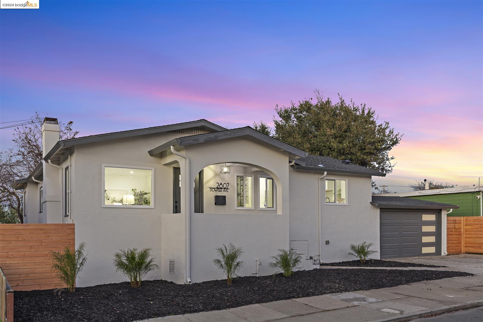 2807 Downer Avenue Richmond, CA 94804 - Photo 1 of 1 a front view of a house with a yard