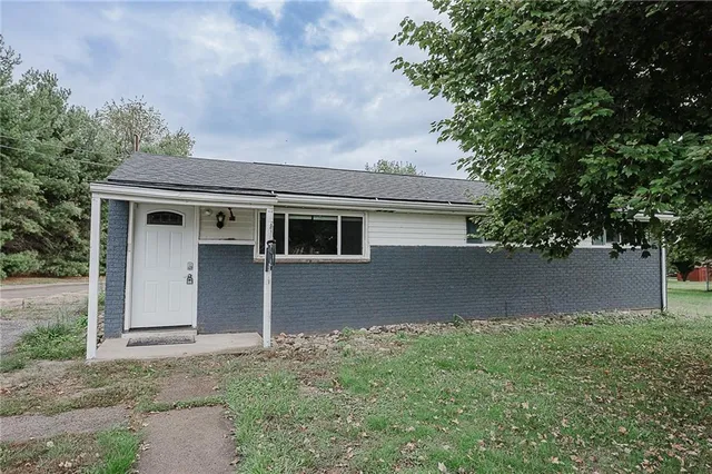a front view of house with yard