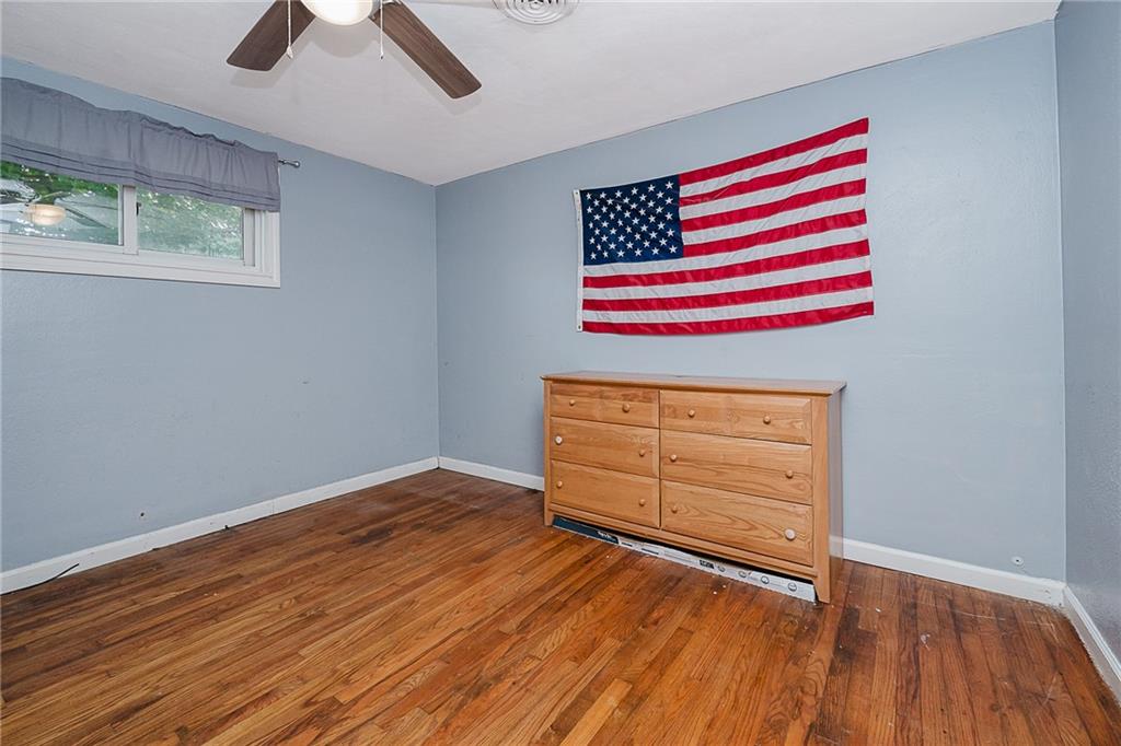191 Bear Creek Road Sarver, PA 16055 - Photo 17 of 25 an empty room with wooden floor and window