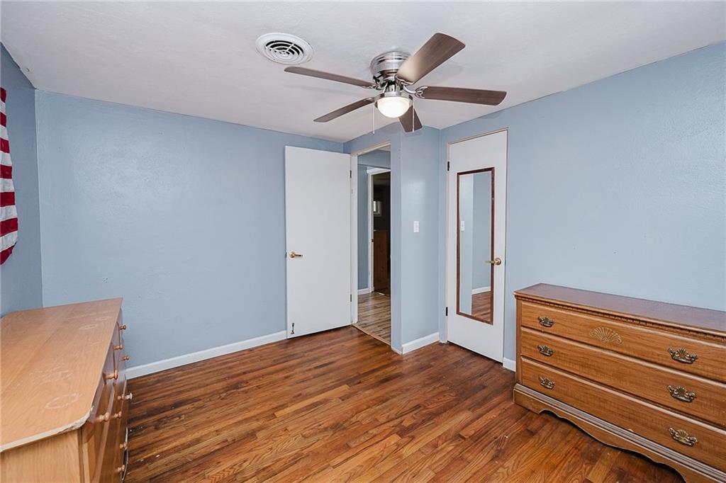 191 Bear Creek Road Sarver, PA 16055 - Photo 18 of 25 a view of room with wooden floor and fan
