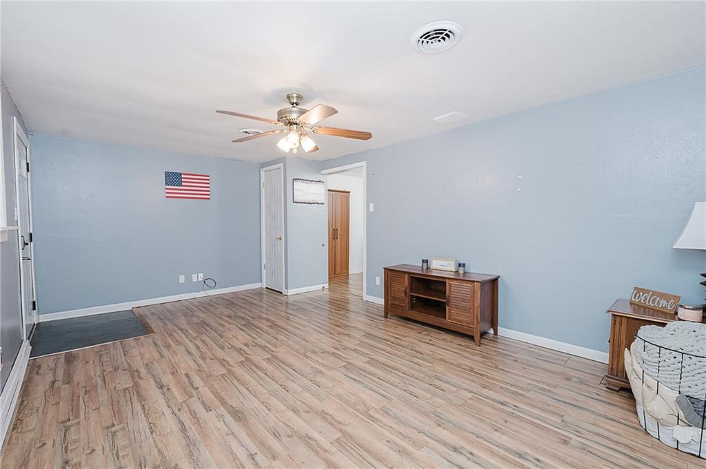 191 Bear Creek Road Sarver, PA 16055 - Photo 6 of 25 wooden floor in an empty room with a window