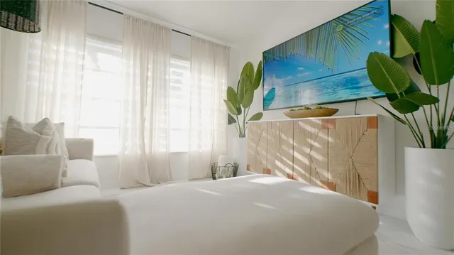 a bathroom with a sink mirror and toilet