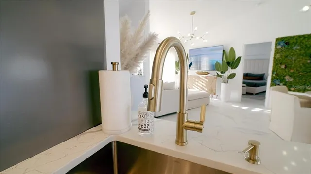 a view of living room with furniture and floor to ceiling window