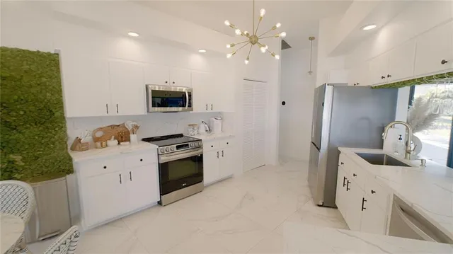 a bedroom with a bed and a mirror