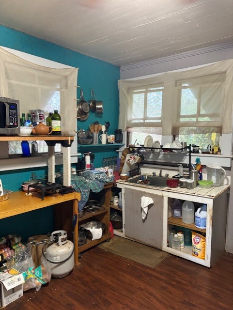 3861 Koula Road Hanapepe, HI 96716 - Photo 21 of 28 a kitchen with a sink stove and wooden floor