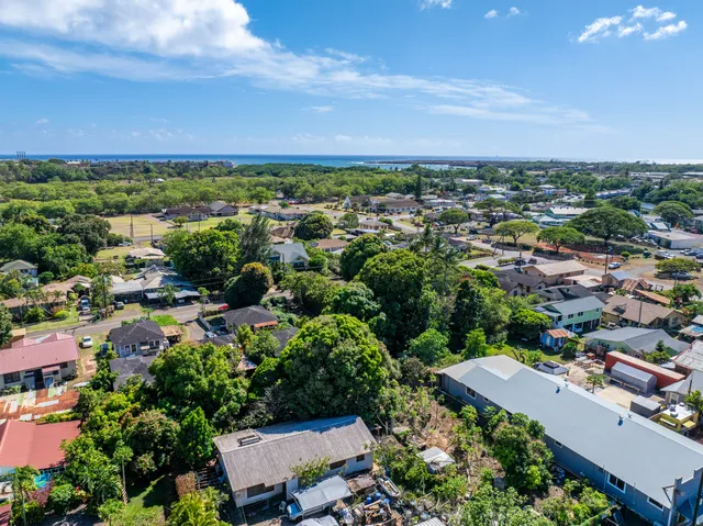 an aerial view of a city with lots of residential buildings