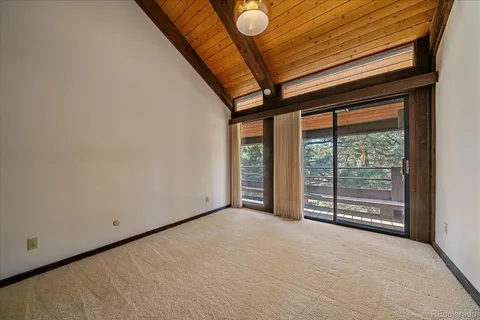 a view of balcony with wooden floor