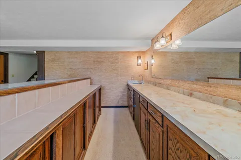 a utility room with a sink a washer and dryer