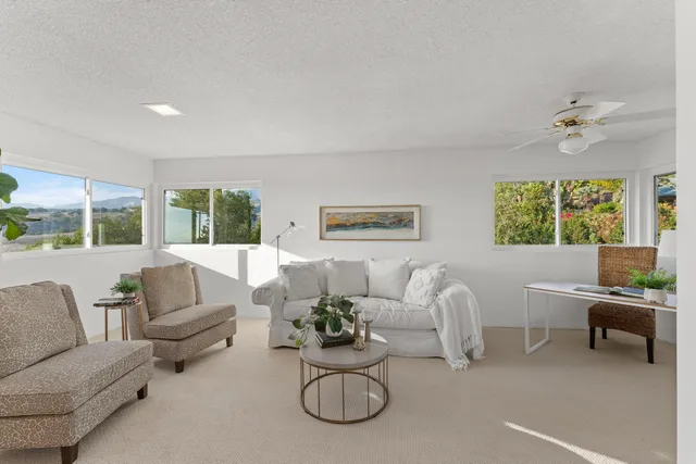 a living room with furniture and a couch