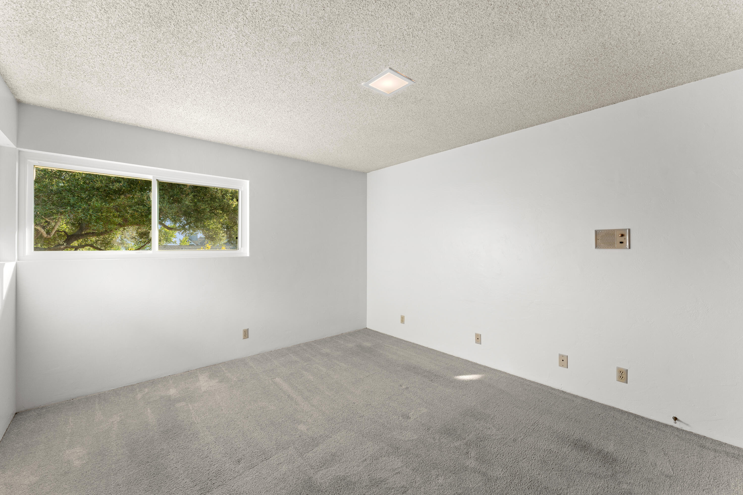 3919 Antone Road Santa Barbara, CA 93110 - Photo 32 of 38 an empty room with a window