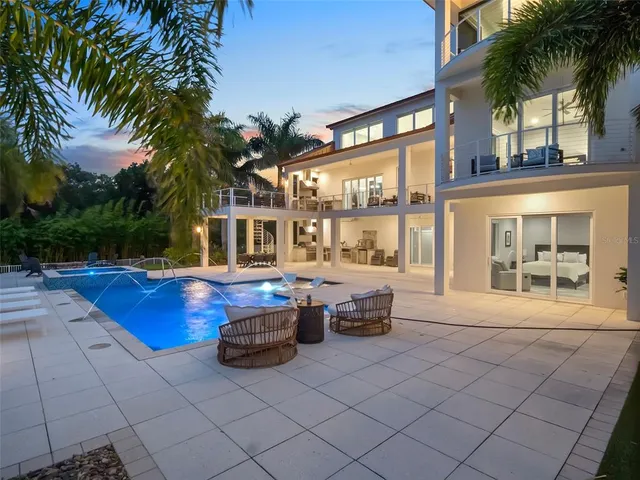 a hallway with a couch and front door