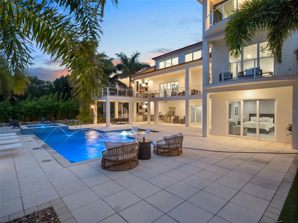 1511 South Riverside Drive New Smyrna Beach, FL 32168 - Photo 11 of 81 a house view with a sitting space and swimming pool
