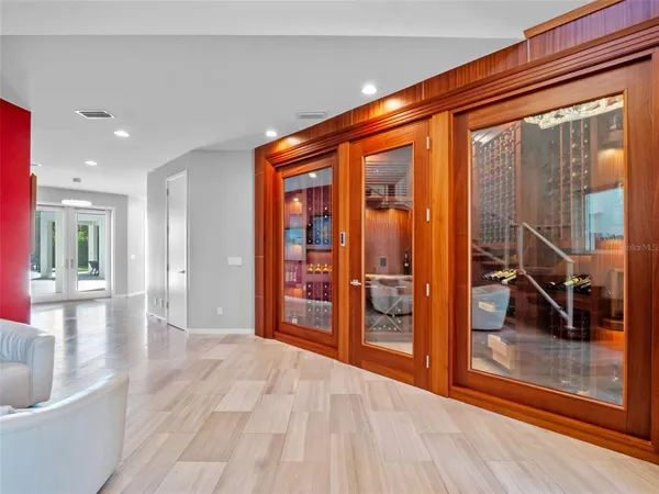 a kitchen with stainless steel appliances kitchen island granite countertop a refrigerator and a stove