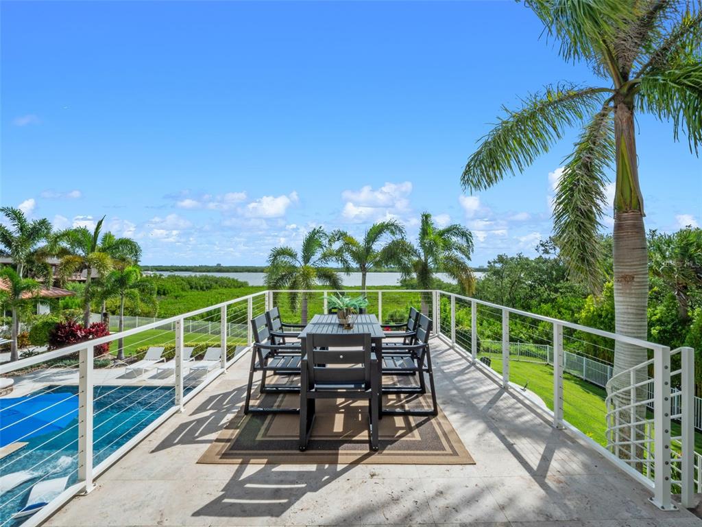 1511 South Riverside Drive New Smyrna Beach, FL 32168 - Photo 55 of 81 a view of a balcony with chairs