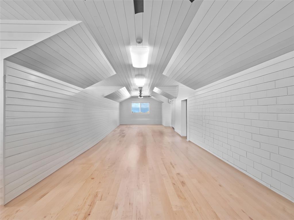 1511 South Riverside Drive New Smyrna Beach, FL 32168 - Photo 72 of 81 a view of empty room with wooden floor