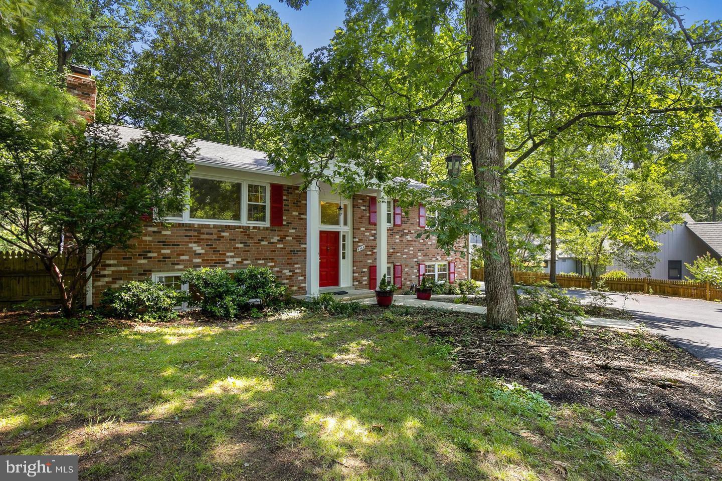 6569 Braddock Road Alexandria, VA 22312 - Photo 1 of 38 a view of a house with a yard