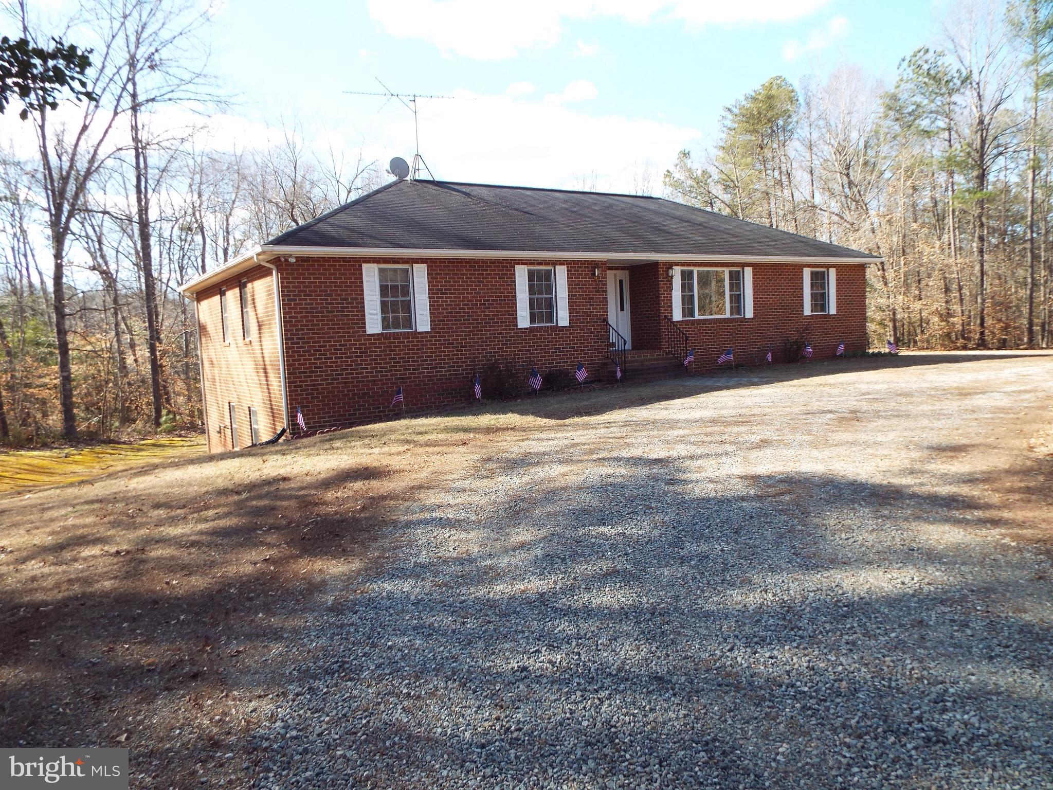 5545 Yanceyville Road Louisa, VA 23093 - Photo 2 of 64 a view of a house with a yard