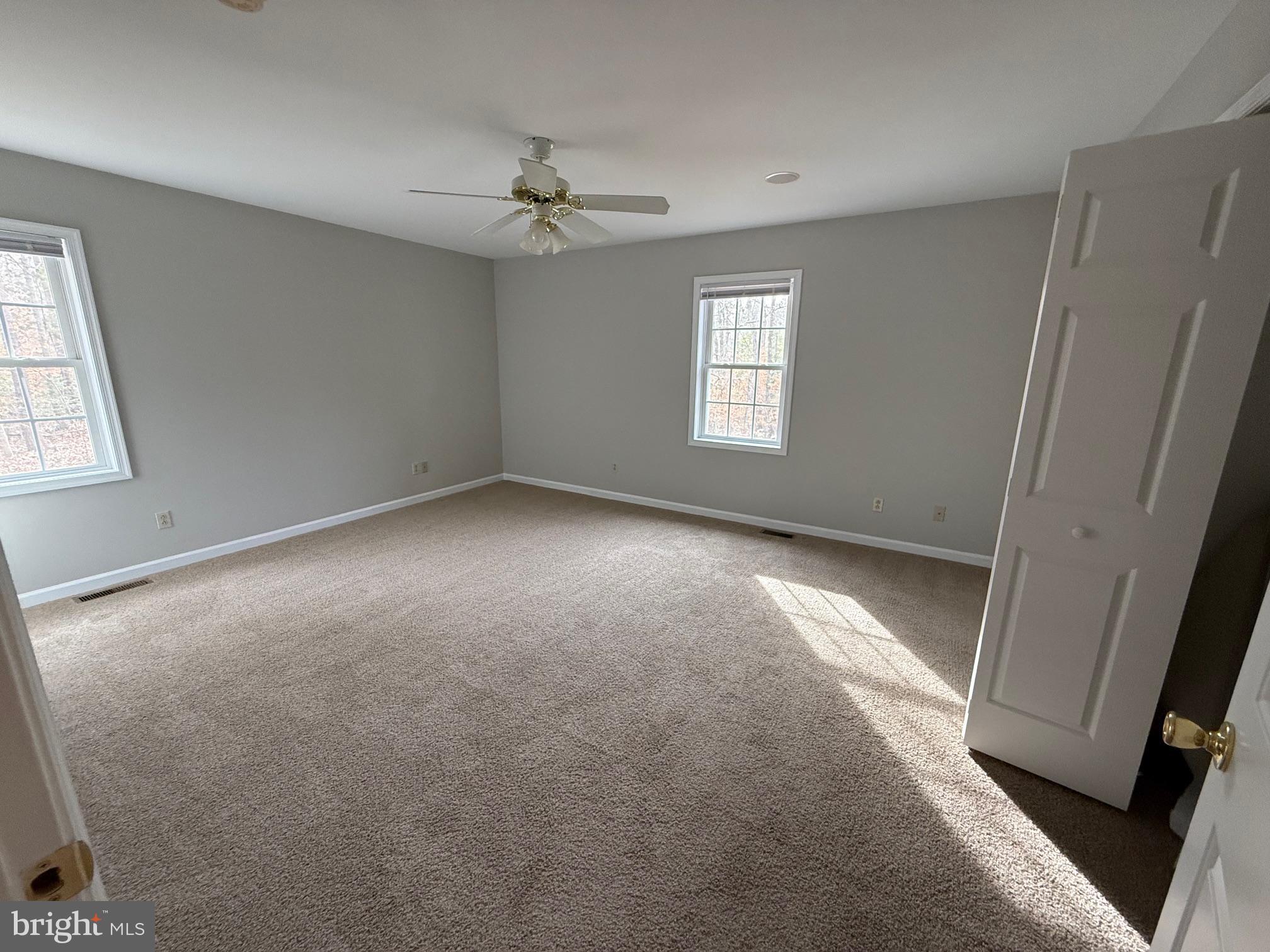 5545 Yanceyville Road Louisa, VA 23093 - Photo 25 of 64 an empty room with a window