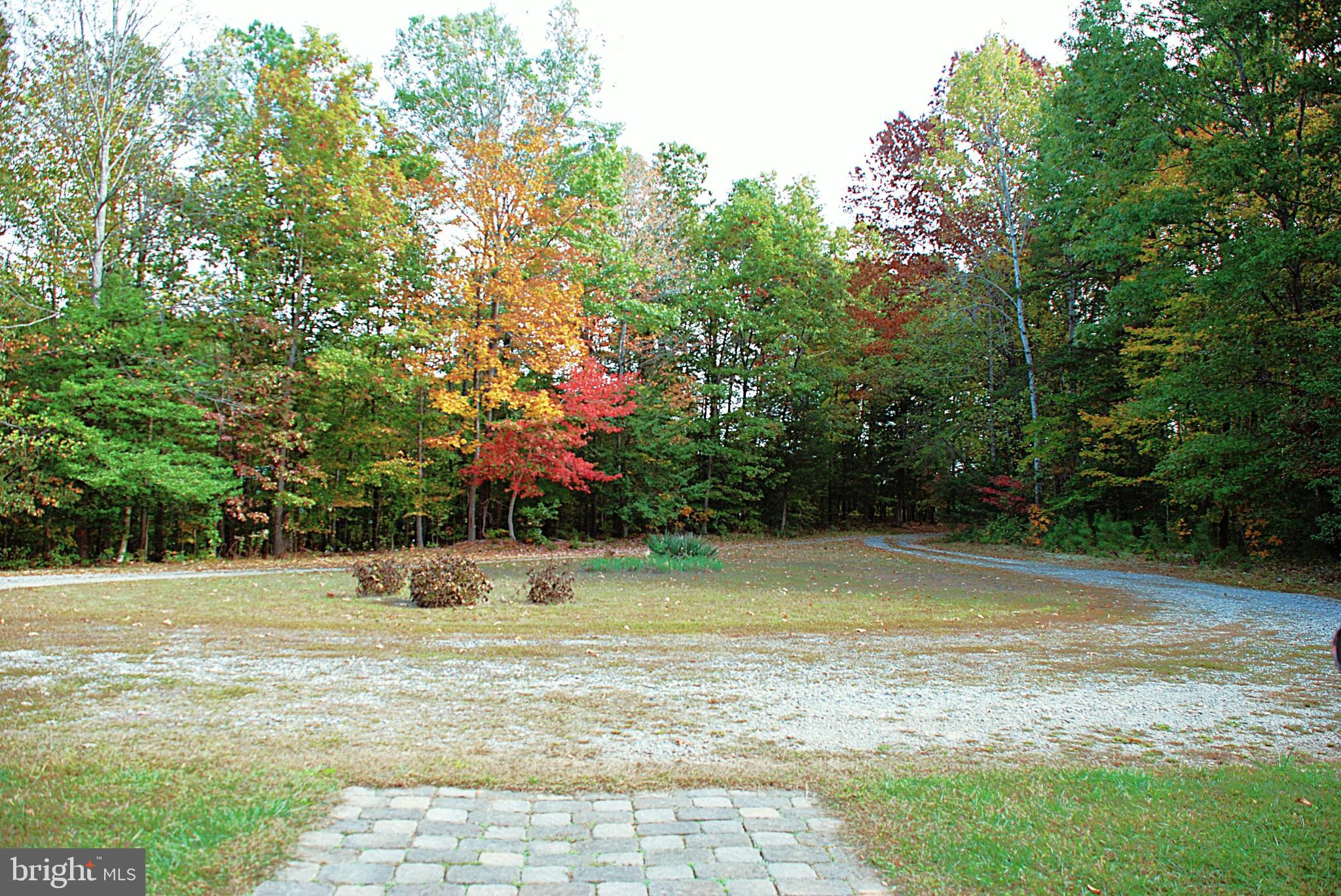 5545 Yanceyville Road Louisa, VA 23093 - Photo 3 of 63 a view of a swimming pool with an outdoor space and seating area