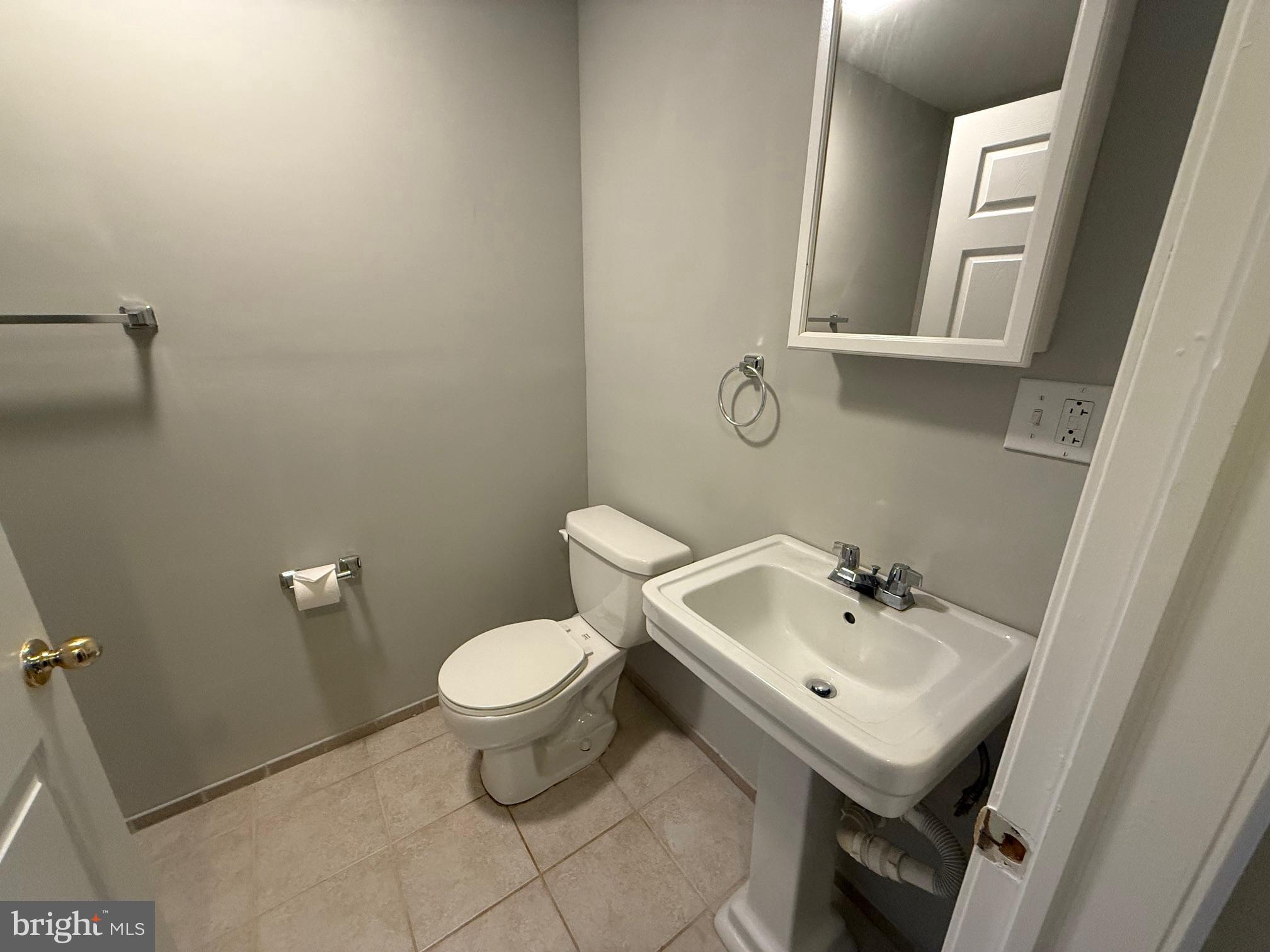 5545 Yanceyville Road Louisa, VA 23093 - Photo 36 of 64 a bathroom with a sink and a toilet