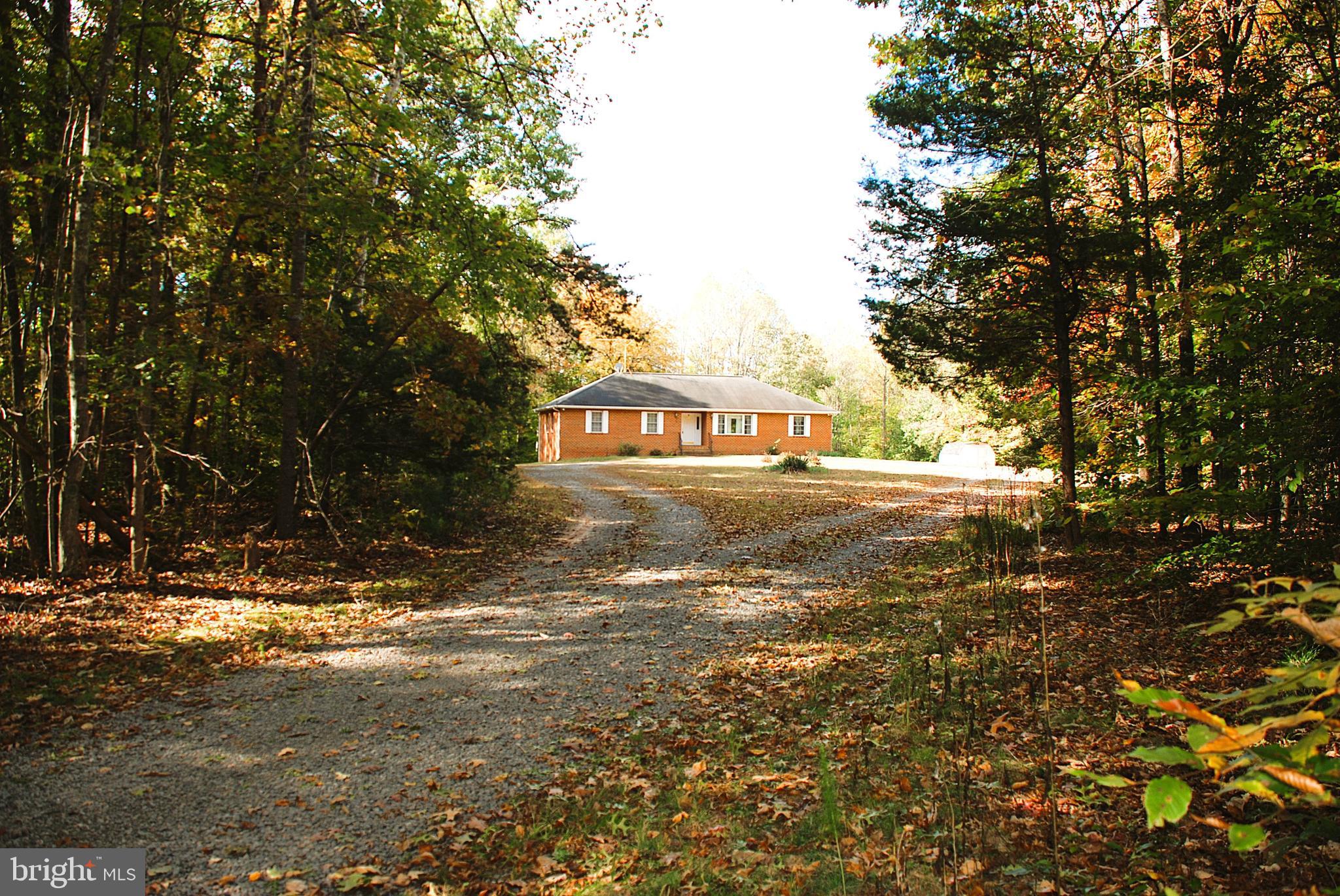 5545 Yanceyville Road Louisa, VA 23093 - Photo 4 of 63 a view of street with trees
