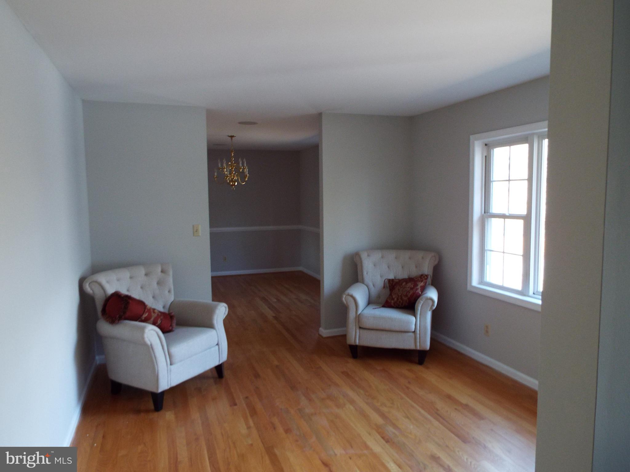 5545 Yanceyville Road Louisa, VA 23093 - Photo 49 of 64 a living room with furniture and a window