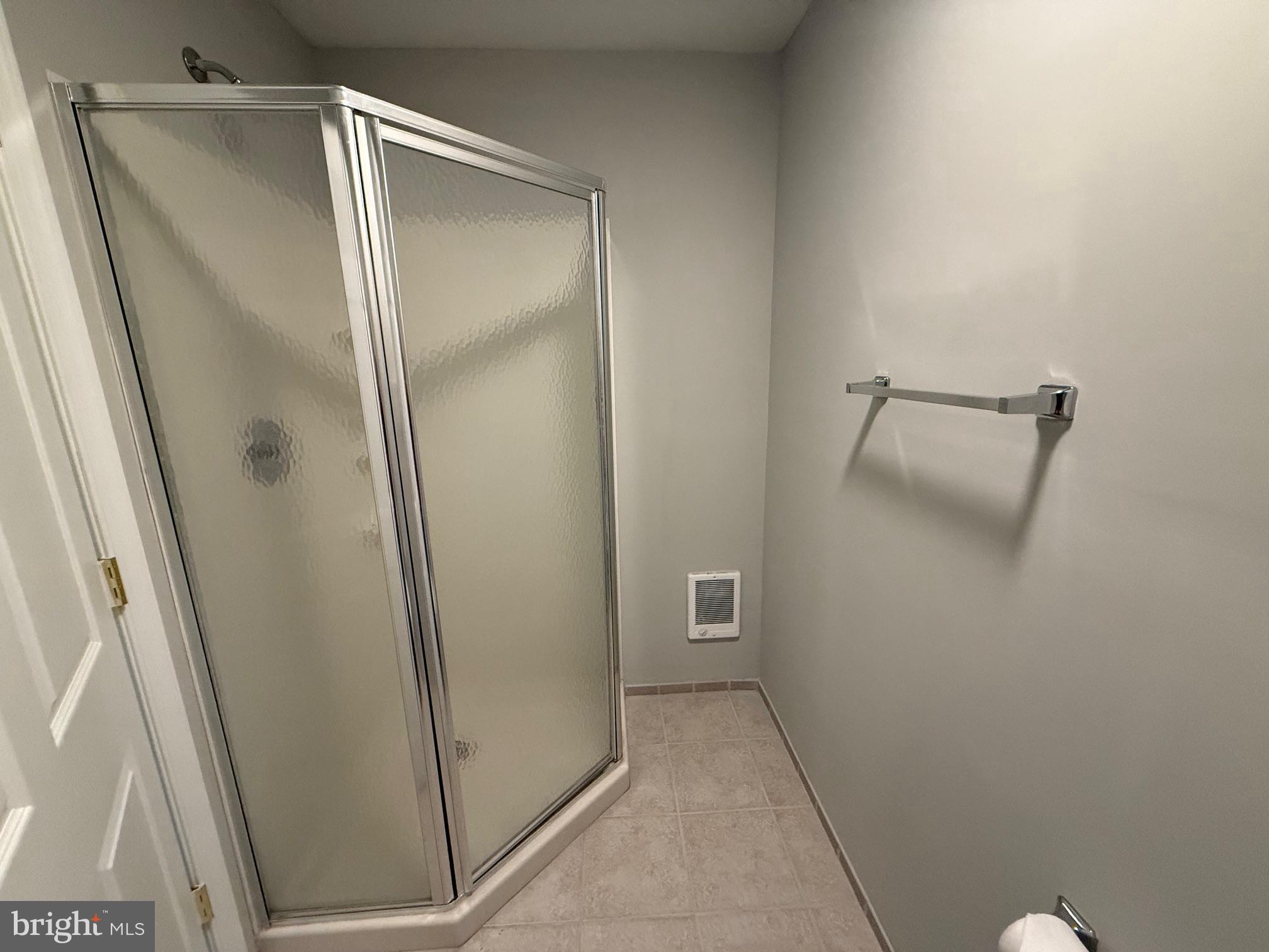 5545 Yanceyville Road Louisa, VA 23093 - Photo 51 of 63 a bathroom with a glass door shower