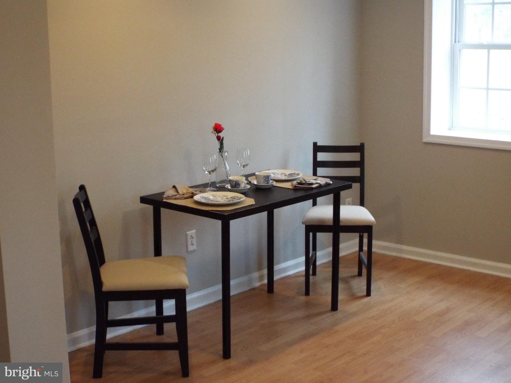 5545 Yanceyville Road Louisa, VA 23093 - Photo 59 of 64 a view of a dining room with furniture and window