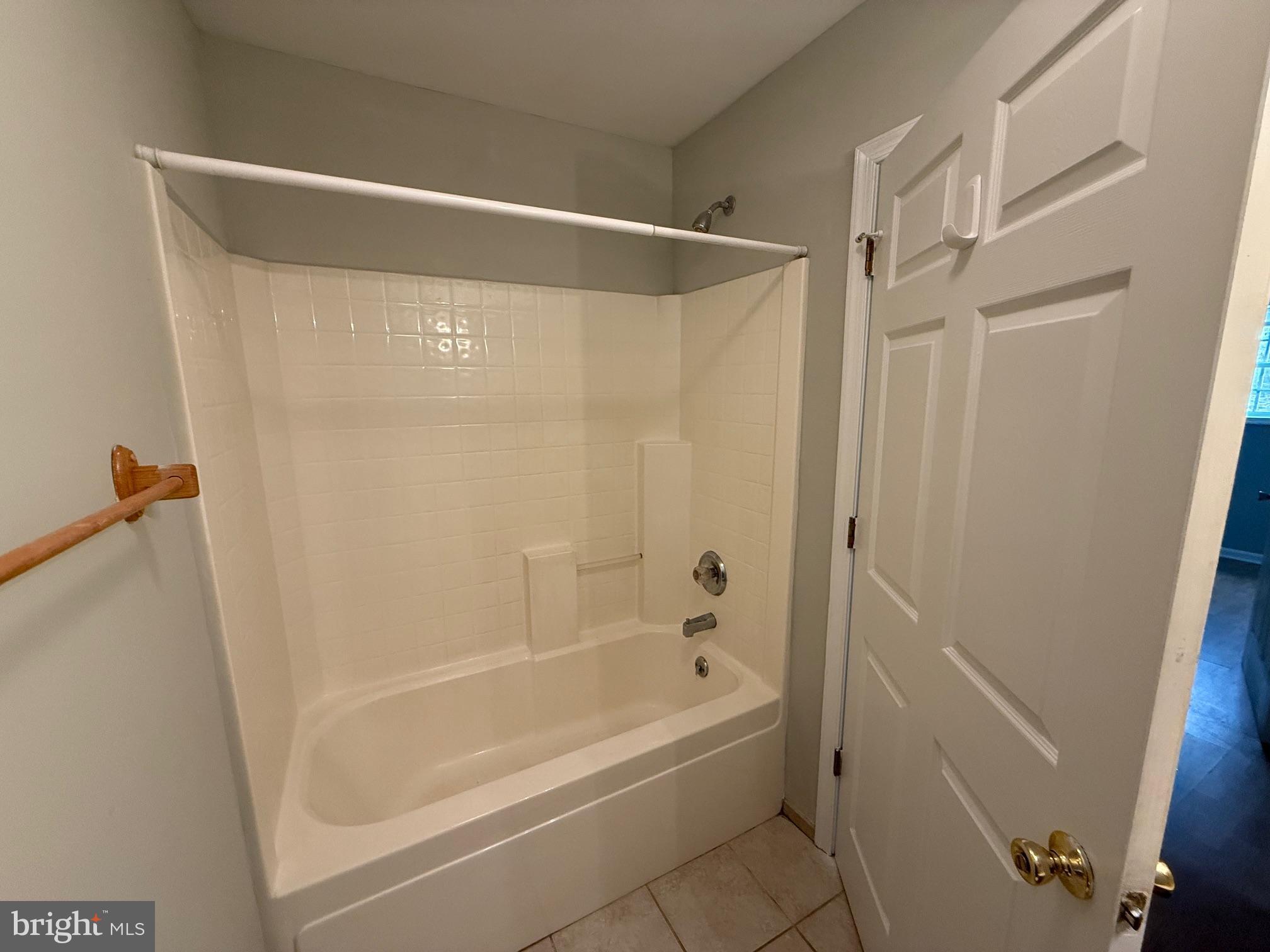 5545 Yanceyville Road Louisa, VA 23093 - Photo 61 of 63 a bathroom with a shower and a bath tub