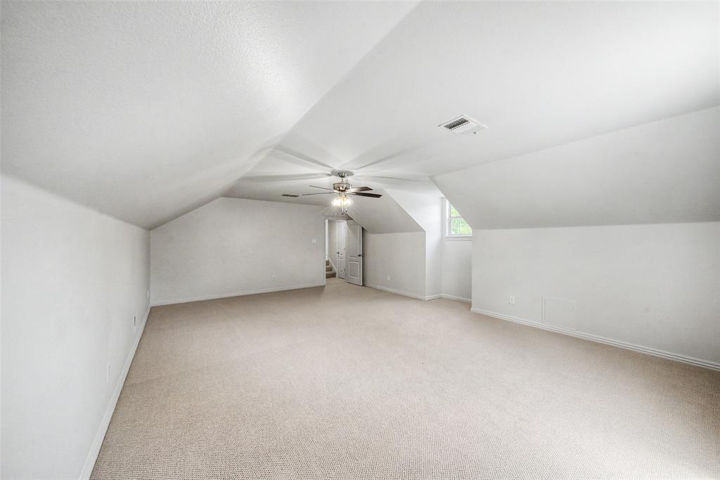 1200 Mount Gilead Road Keller, TX 76262 - Photo 32 of 38 an empty room with a ceiling fan and window