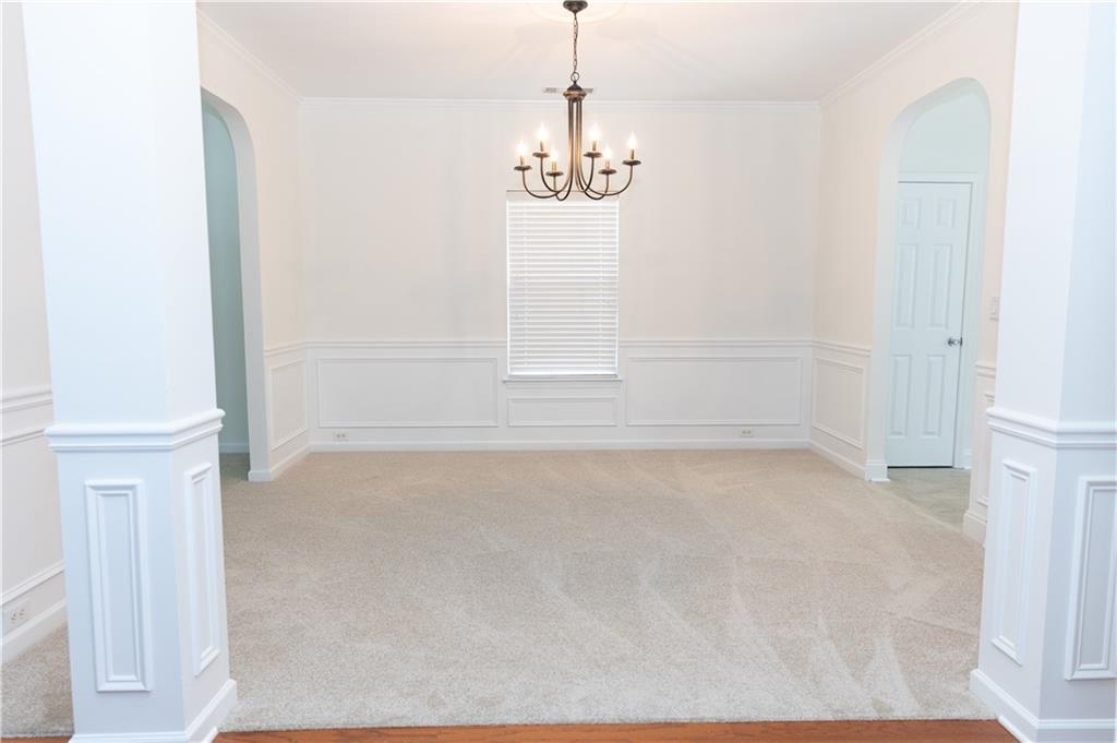 502 Streamside Place Canton, GA 30115 - Photo 5 of 33 a view of an empty room with window