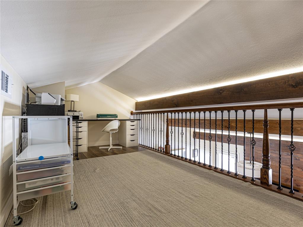 9999 Boat Club Road, Unit 601 Fort Worth, TX 76179 - Photo 17 of 39 Spacious loft designed as a flexible extension of the home’s living space.