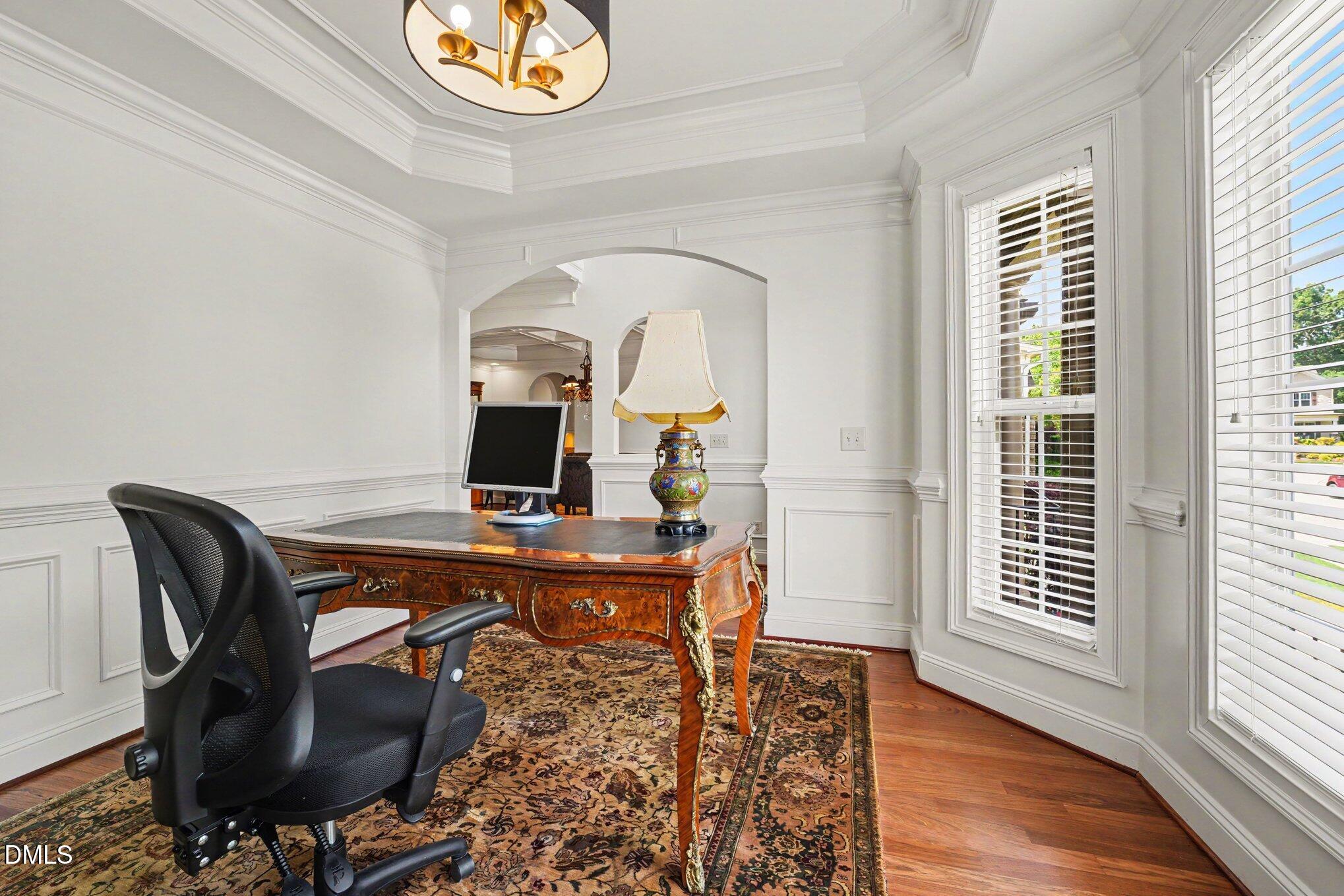 1729 Frenchwood Drive Raleigh, NC 27612 - Photo 27 of 46 a living room with furniture and a fireplace